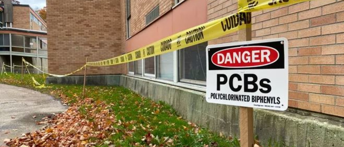 A PCB danger sign outside a Burlington, VT, school